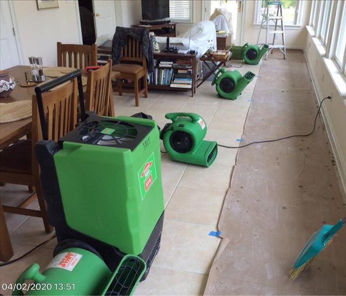 Living room with SERVPRO drying equipment