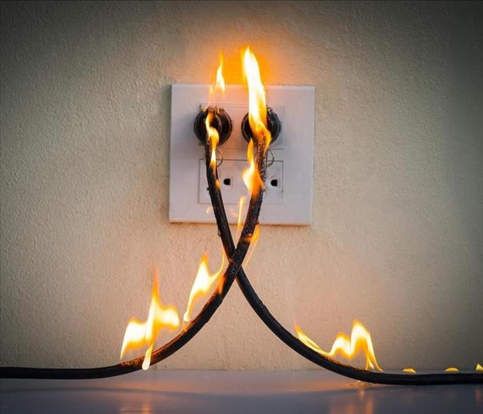 flames at an electrical outlet