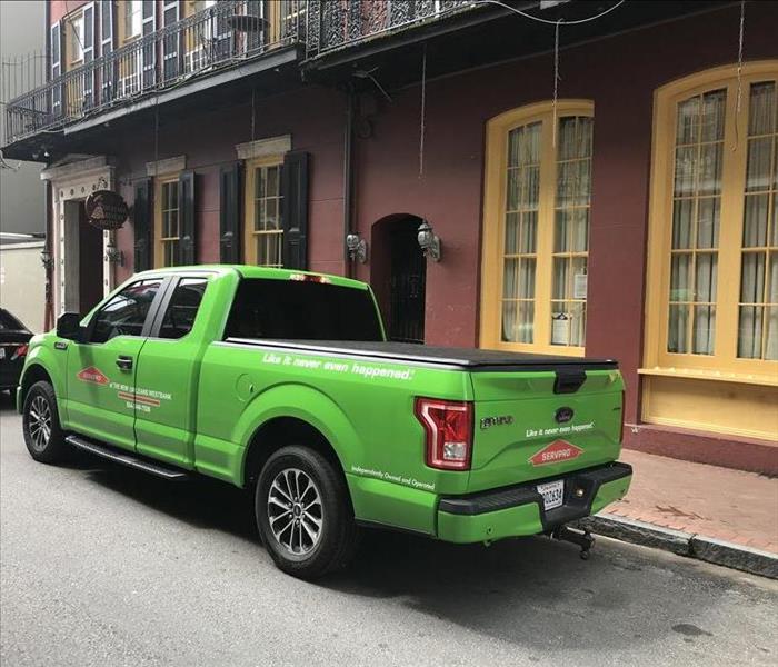 SERVPRO green pickup truck parked