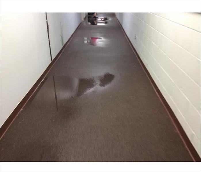 Hallway with puddles of water